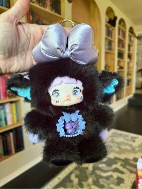 NIB Nommi Fantasy world Cute Plush Keychain with Purple Bow and Black Fur
